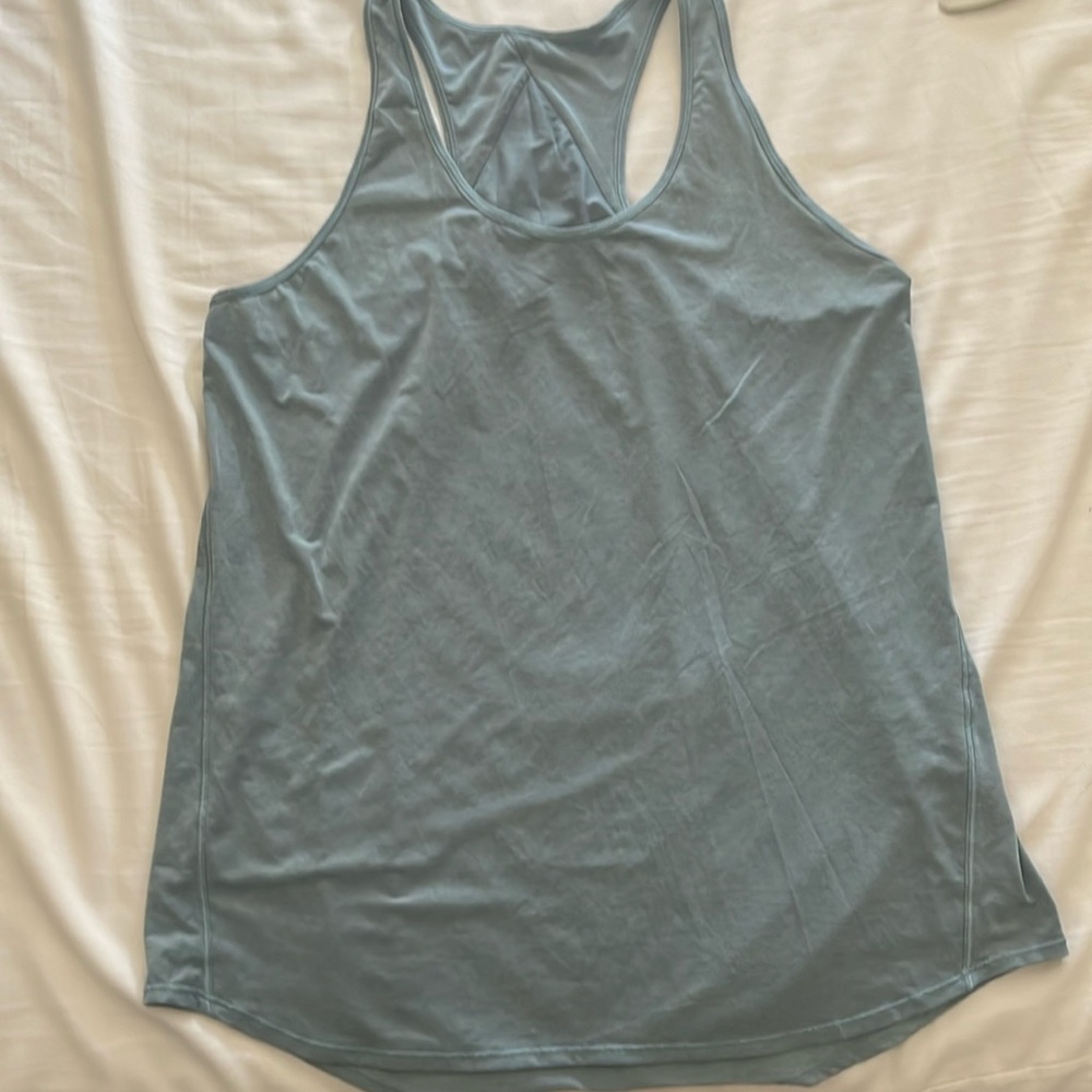 Women’s Lululemon essential pleated back tank in blue cast.